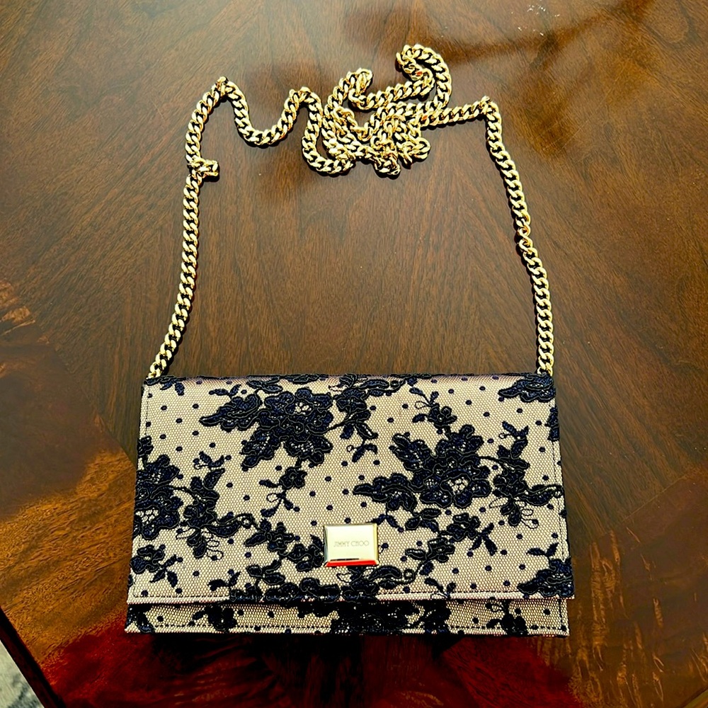 NITB Jimmy Choo Navy lace evening bag with gold chain shoulder strap..